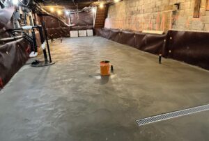 Basement underpinning project showing foundation reinforcement by Stellar Work Construction